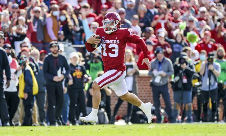 Nov 20, 2021; Norman, Oklahoma, USA; Oklahoma Sooners quarterback Caleb Williams (13) runs for a touchdown during the first quarter against the Iowa State Cyclones at Gaylord Family-Oklahoma Memorial Stadium. Mandatory Credit: Kevin Jairaj-USA TODAY Sports