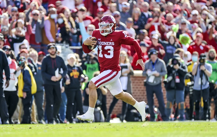 Nov 20, 2021; Norman, Oklahoma, USA; Oklahoma Sooners quarterback Caleb Williams (13) runs for a touchdown during the first quarter against the Iowa State Cyclones at Gaylord Family-Oklahoma Memorial Stadium. Mandatory Credit: Kevin Jairaj-USA TODAY Sports
