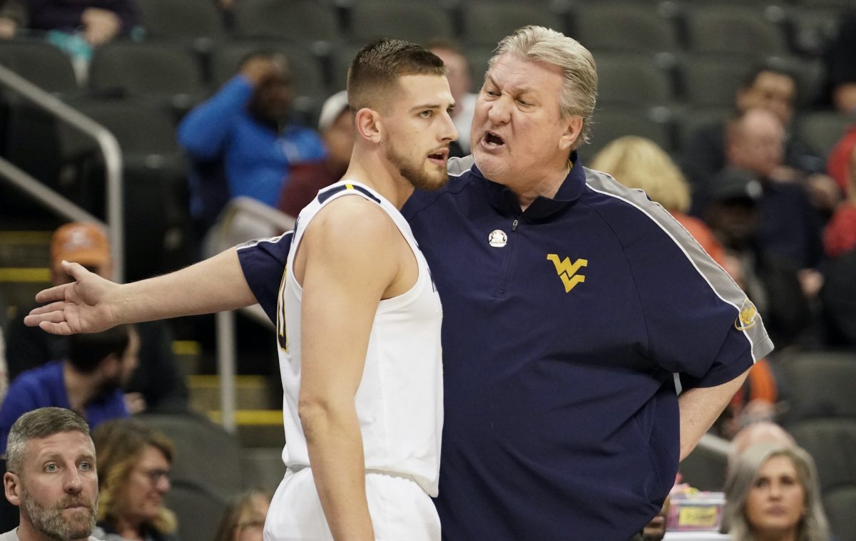 Erik Stevenson and Bob Huggins.