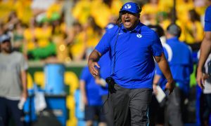 Oct 16, 2021; Waco, Texas, USA; Brigham Young Cougars head coach Kalani Sitake yells to his team during the second half against the Baylor Bears at McLane Stadium. Mandatory Credit: Jerome Miron-USA TODAY Sports