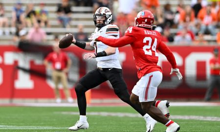 Nov 18, 2023; Houston, Texas, USA; Houston Cougars defensive back Adari Haulcy (24) applies pressure to Oklahoma State Cowboys quarterback Alan Bowman (7) during the first quarter at TDECU Stadium. Mandatory Credit: Maria Lysaker-USA TODAY Sports