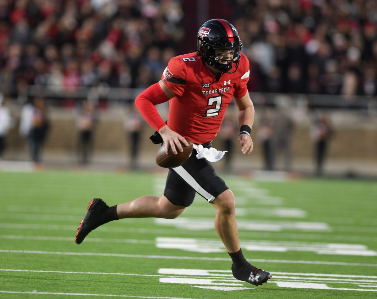 Texas Tech's quarterback Behren Morton (2) runs with the ball against TCU in a Big 12 football game, Thursday, Nov. 2, 2023, at Jones AT&T Stadium.