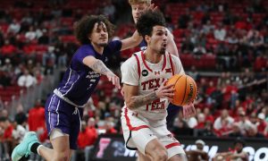 Jan 1, 2024; Lubbock, Texas, USA; Texas Tech Red Raiders guard Pop Isaacs (2) stops to take a shot against North Alabama Lions guard KJ Johnson (3) in the first half at United Supermarkets Arena. Mandatory Credit: Michael C. Johnson-USA TODAY Sports