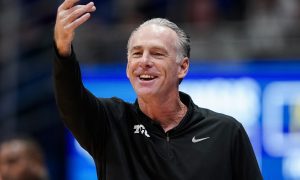 Jan 6, 2024; Lawrence, Kansas, USA; TCU Horned Frogs head coach Jamie Dixon reacts during the first half against the TCU Horned Frogs at Allen Fieldhouse. Mandatory Credit: Jay Biggerstaff-USA TODAY Sports
