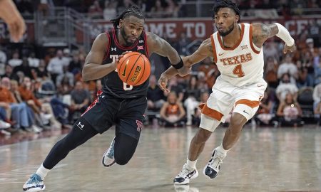 Jan 6, 2024; Austin, Texas, USA; Texas Tech Red Raiders guard Joe Toussaint (6) drives to the basket while defended by Texas Longhorns guard Tyrese Hunter (4) during the second half at Moody Center. Mandatory Credit: Scott Wachter-USA TODAY Sports