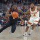 Jan 6, 2024; Austin, Texas, USA; Texas Tech Red Raiders guard Joe Toussaint (6) drives to the basket while defended by Texas Longhorns guard Tyrese Hunter (4) during the second half at Moody Center. Mandatory Credit: Scott Wachter-USA TODAY Sports