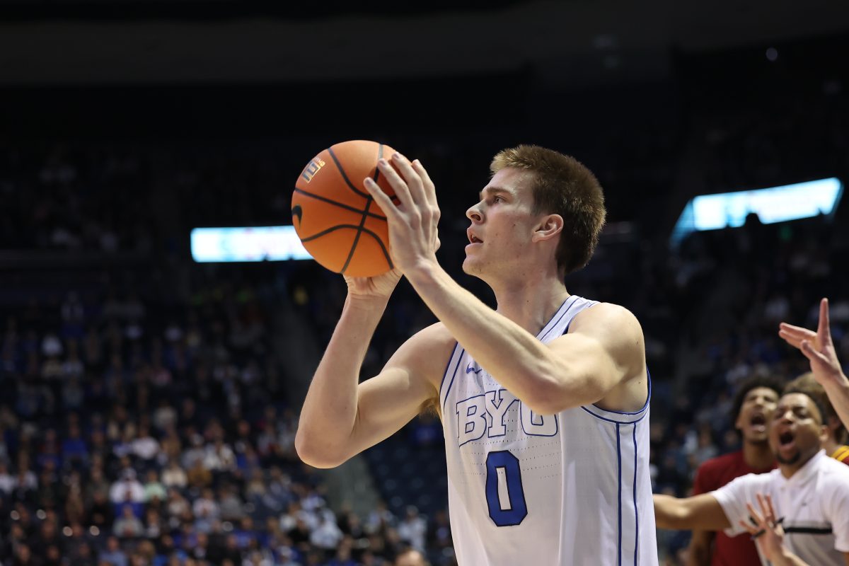 Jan 16, 2024; Provo, Utah, USA; Brigham Young Cougars forward Noah Waterman (0) shoots a three point shot against the Iowa State Cyclones at Marriott Center. Mandatory Credit: Rob Gray-USA TODAY Sports