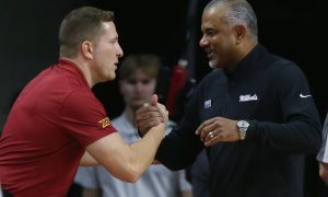 Iowa State Cyclones men's basketball head coach T. J. Otzelberger greets Kansas State men's basketball head coach Jerome Tang (right) before the game in the Big-12 conference showdown of an NCAA college basketball at Hilton Coliseum on Wednesday, Jan. 24, 2024, in Ames, Iowa.
