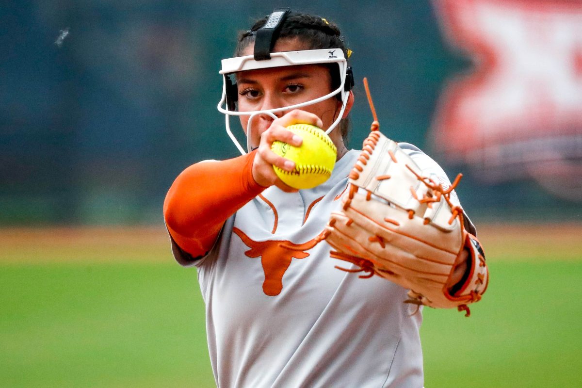 Texas pitcher Citlaly Gutierrez (77) pitches during the Big 12 softball tournament game between the Texas Longhorns and the Kansas Blue Jays at USA Softball Hall of Fame Stadium in Oklahoma City, on Friday, May 12, 2023.