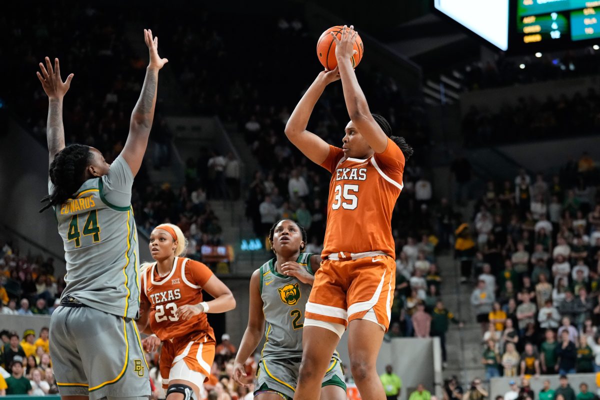 Feb 1, 2024; Waco, Texas, USA; Texas Longhorns forward Madison Booker (35) scores a basket against Baylor Lady Bears forward Dre'Una Edwards (44) during the first half at Paul and Alejandra Foster Pavilion. Mandatory Credit: Chris Jones-USA TODAY Sports