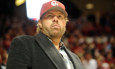 Jan 8, 2014; Norman, OK, USA; Country music artist Toby Keith watches action between the Oklahoma Sooners and the Kansas Jayhawks at Lloyd Noble Center. Mandatory Credit: Mark D. Smith-USA TODAY Sports