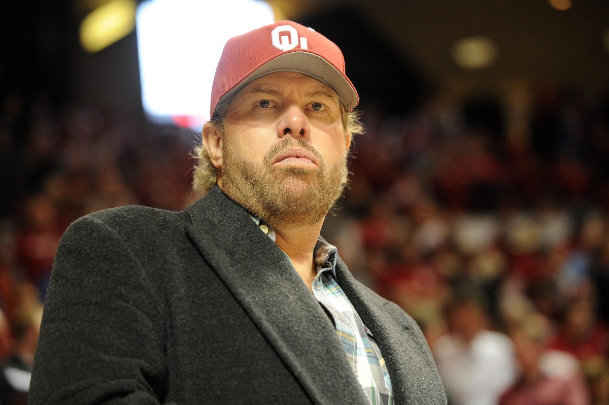 Jan 8, 2014; Norman, OK, USA; Country music artist Toby Keith watches action between the Oklahoma Sooners and the Kansas Jayhawks at Lloyd Noble Center. Mandatory Credit: Mark D. Smith-USA TODAY Sports