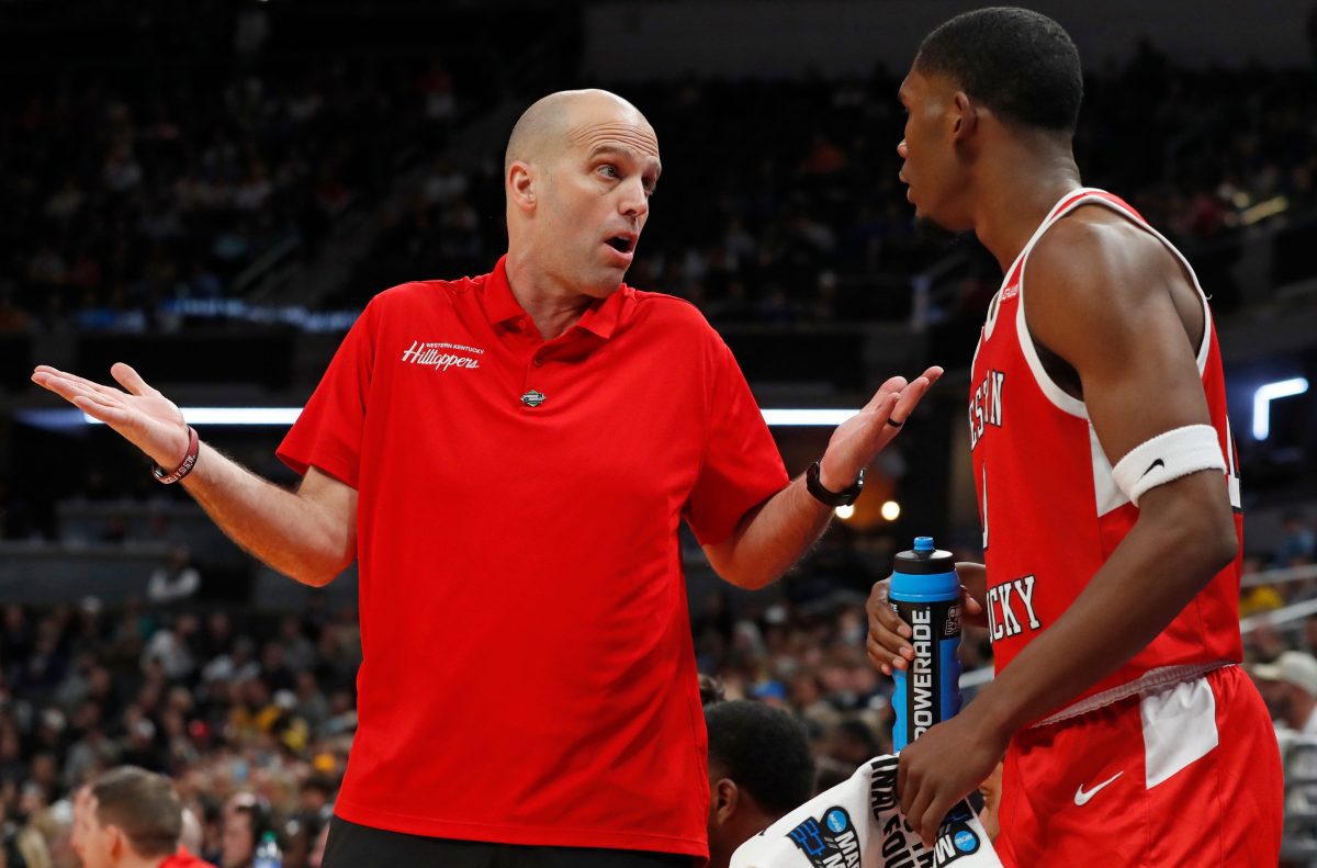 Western Kentucky Hilltoppers head coach Steve Lutz talks to Western Kentucky Hilltoppers guard Brandon Newman (10) during NCAA Men’s Basketball Tournament game against the Marquette Golden Eagles, Friday, March 22, 2024, at Gainbridge Fieldhouse in Indianapolis. Marquette Golden Eagles 87-69.