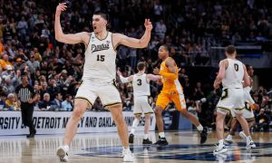 Purdue center Zach Edey celebrates a play against Tennessee during the second half of the NCAA tournament Midwest Regional Elite 8 round at Little Caesars Arena in Detroit on Sunday, March 31, 2024. Edey's 40 points helped the Boilermakers to a 72-66 win and their first Final Four since 1980.