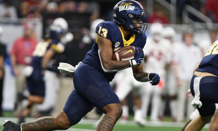 Dec 2, 2023; Detroit, MI, USA; Toledo Rockets running back Peny Boone (13) runs the ball against the Miami (OH) Redhawks in the first quarter at Ford Field. Mandatory Credit: Lon Horwedel-USA TODAY Sports