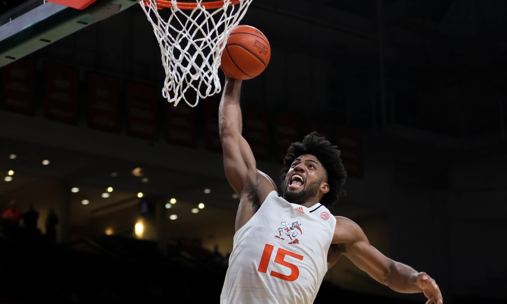 Mar 6, 2024; Coral Gables, Florida, USA; Miami Hurricanes forward Norchad Omier (15) dunks the basketball against the Boston College Eagles during the second half at Watsco Center. Mandatory Credit: Sam Navarro-USA TODAY Sports