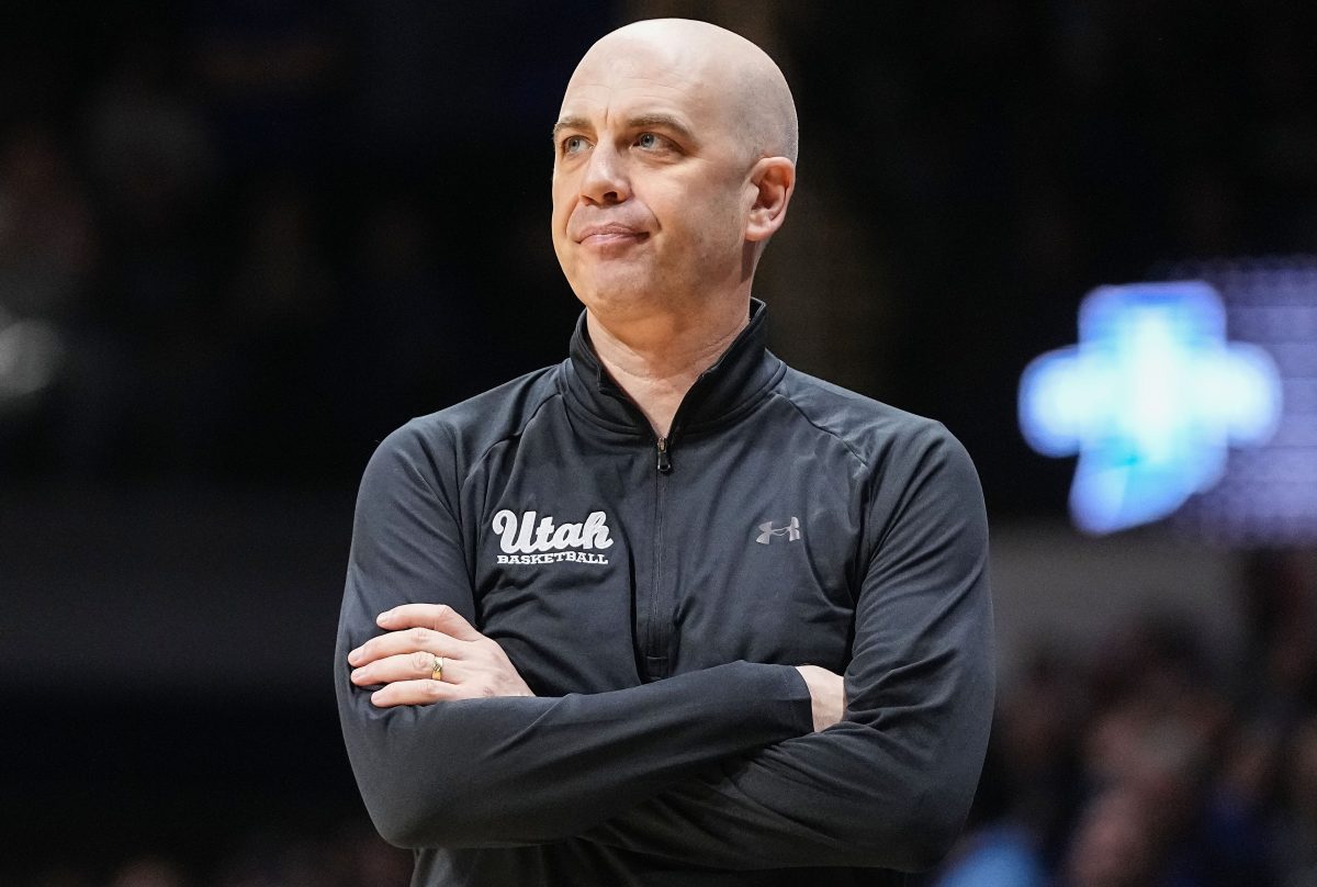 Utah Utes head coach Craig Smith watches the game from the sidelines Tuesday, April 2, 2024, during the NIT semifinals at Hinkle Fieldhouse in Indianapolis. The Indiana State Sycamores defeated the Utah Utes, 100-90.