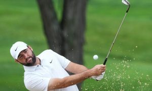 May 15, 2024; Louisville, Kentucky, USA; Scottie Scheffler chips out of a sand trap near the 11th green during a practice round for the PGA Championship golf tournament at Valhalla Golf Club. Mandatory Credit: Matt Stone-USA TODAY Sports
