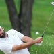 May 15, 2024; Louisville, Kentucky, USA; Scottie Scheffler chips out of a sand trap near the 11th green during a practice round for the PGA Championship golf tournament at Valhalla Golf Club. Mandatory Credit: Matt Stone-USA TODAY Sports