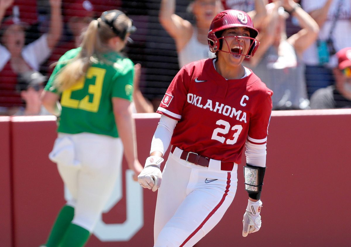Oklahoma's Tiare Jennings (23) celebrates in the first inning of the Norman Regional NCAA tournament game between the Oklahoma Sooners and the Oregon Ducks at Love's Field in Norman, Okla. Saturday, May, 18, 2024.