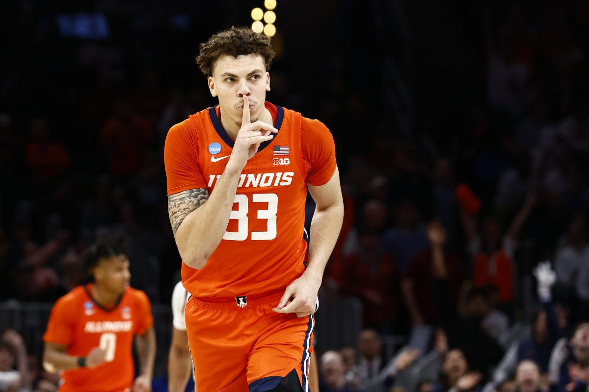 Mar 28, 2024; Boston, MA, USA; Illinois Fighting Illini forward Coleman Hawkins (33) reacts against the Iowa State Cyclones in the semifinals of the East Regional of the 2024 NCAA Tournament at TD Garden. Mandatory Credit: Winslow Townson-USA TODAY Sports