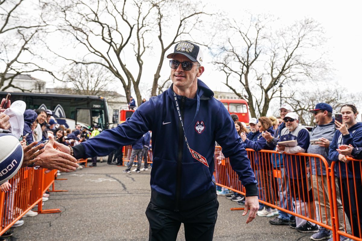 Apr 13, 2024; Hartford, CT, USA; UConn Huskies head coach Dan Hurley is greeted by fans as he and his team arrive at the State Capitol before teams NCAA Mens Basketball Championship victory parade. Mandatory Credit: David Butler II-USA TODAY Sports