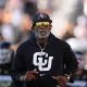 Aug 29, 2024; Boulder, Colorado, USA; Colorado Buffaloes head coach Deion Sanders runs onto the field before the game against the North Dakota State Bison at Folsom Field. Mandatory Credit: Ron Chenoy-USA TODAY Sports