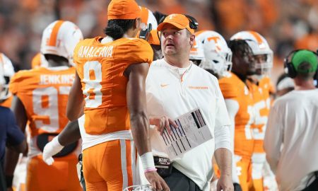 Tennessee head coach Josh Heupel and Tennessee quarterback Nico Iamaleava (8) chat on the sidelines during a game between Tennessee and Kent State at Neyland Stadium, in Knoxville, Tenn., Saturday, Sept. 14, 2024.