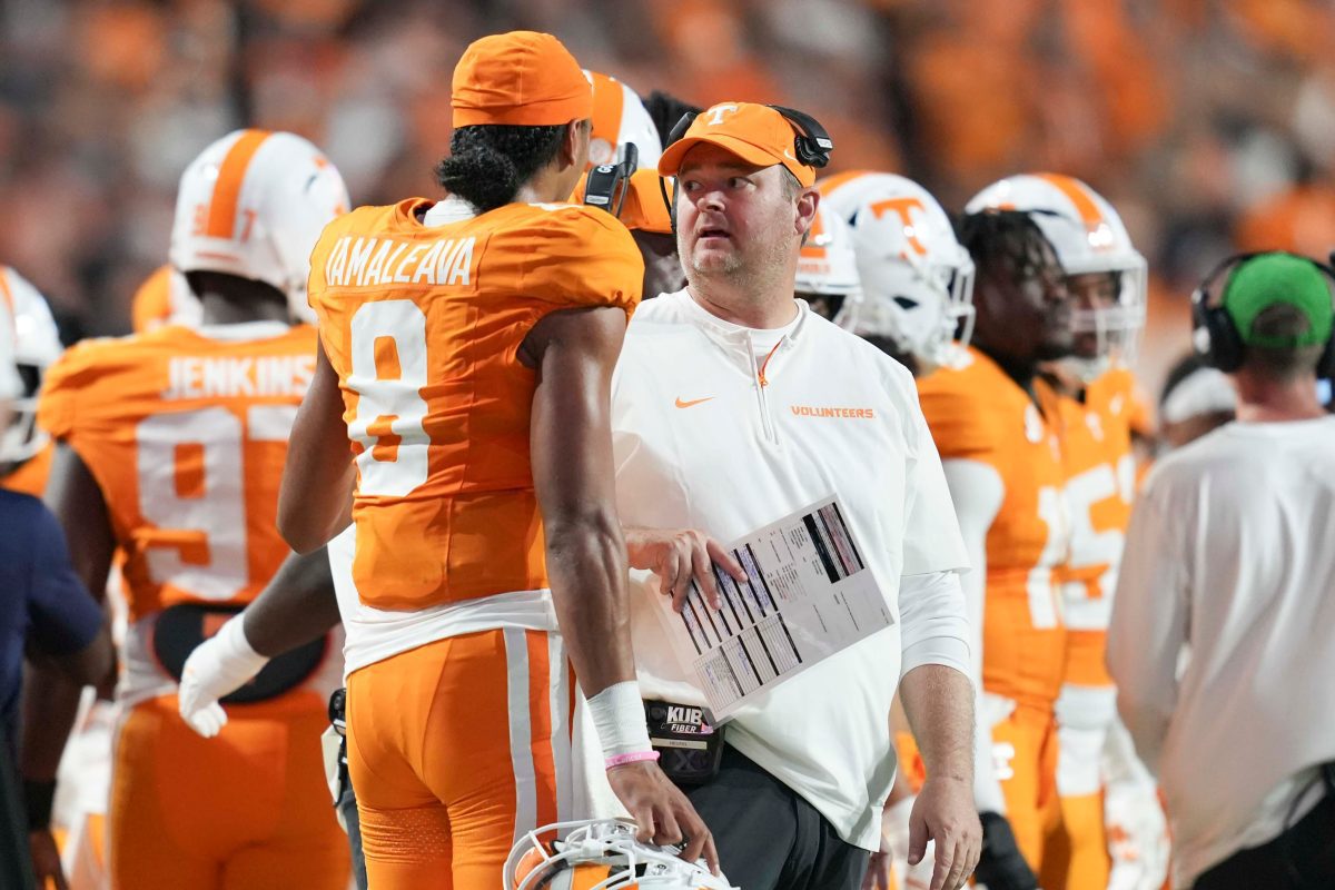 Tennessee head coach Josh Heupel and Tennessee quarterback Nico Iamaleava (8) chat on the sidelines during a game between Tennessee and Kent State at Neyland Stadium, in Knoxville, Tenn., Saturday, Sept. 14, 2024.