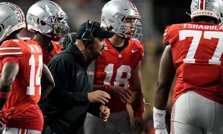 Sep 7, 2024; Columbus, Ohio, USA; Ohio State Buckeyes head coach Ryan Day talks to quarterback Will Howard (18) in the huddle during the second half of the NCAA football game against the Western Michigan Broncos at Ohio Stadium.