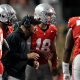 Sep 7, 2024; Columbus, Ohio, USA; Ohio State Buckeyes head coach Ryan Day talks to quarterback Will Howard (18) in the huddle during the second half of the NCAA football game against the Western Michigan Broncos at Ohio Stadium.