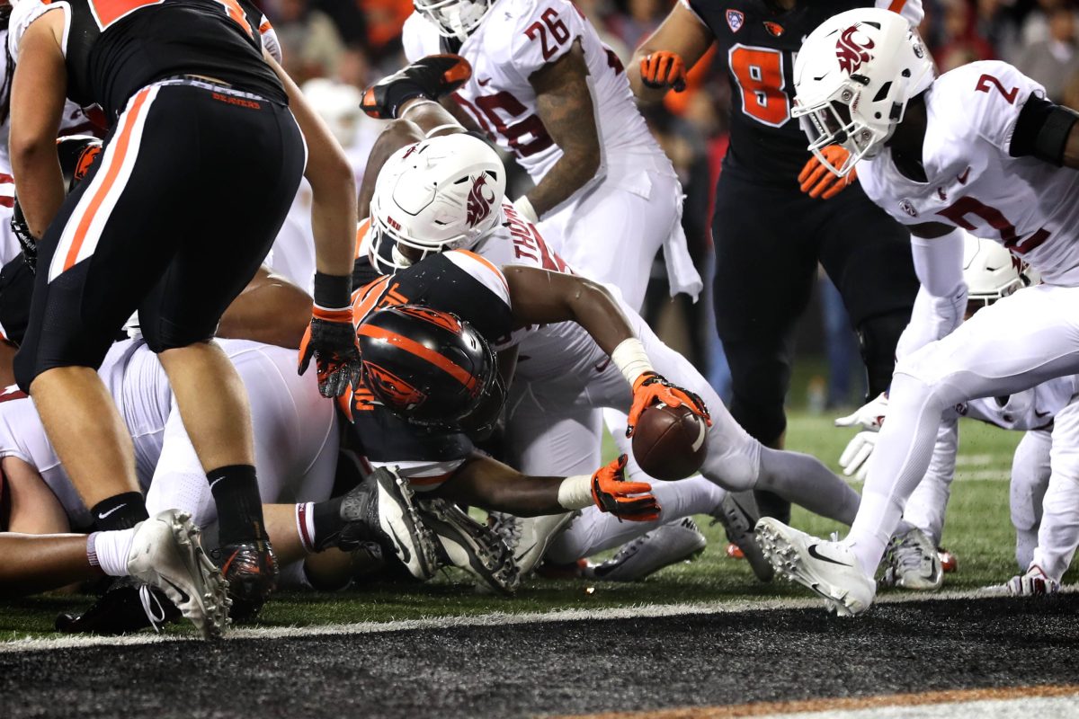 Oct 6, 2018; Corvallis, OR, USA; Oregon State Beavers running back Jermar Jefferson (22) reaches over the goal line for a touchdown against the Washington State Cougars in the second half at Reser Stadium. Mandatory Credit: Jaime Valdez-USA TODAY Sports