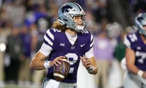 Oct 26, 2024; Manhattan, Kansas, USA; Kansas State Wildcats quarterback Avery Johnson (2) drops back to pass during the third quarter against the Kansas Jayhawks at Bill Snyder Family Football Stadium. Mandatory Credit: Scott Sewell-Imagn Images