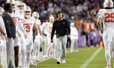 Nov 9, 2024; Fort Worth, Texas, USA; Oklahoma State Cowboys head coach Mike Gundy walks down the sidelines in the game against the TCU Horned Frogs at Amon G. Carter Stadium. Mandatory Credit: Tim Heitman-Imagn Images
