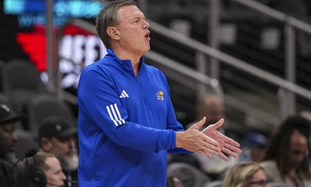 Nov 12, 2024; Atlanta, Georgia, USA; Kansas Jayhawks head coach Bill Self reacts on the bench against the Michigan State Spartans during the first half at State Farm Arena. Mandatory Credit: Dale Zanine-Imagn Images