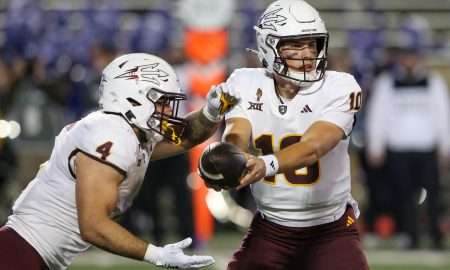 Nov 16, 2024; Manhattan, Kansas, USA; Arizona State Sun Devils quarterback Sam Leavitt (10) hands off to running back Cam Skattebo (4) against the Kansas State Wildcats during the second quarter at Bill Snyder Family Football Stadium. Mandatory Credit: Scott Sewell-Imagn Images