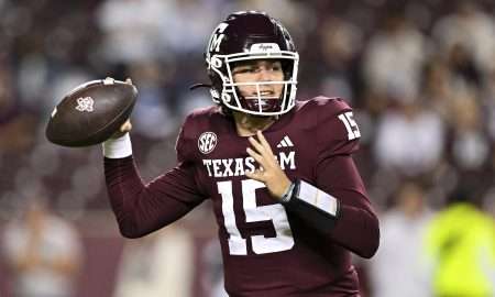 Nov 16, 2024; College Station, Texas, USA; Texas A&M Aggies quarterback Conner Weigman (15) looks to throw the ball during the fourth quarter against the New Mexico State Aggies at Kyle Field. Mandatory Credit: Maria Lysaker-Imagn Images