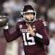 Nov 16, 2024; College Station, Texas, USA; Texas A&M Aggies quarterback Conner Weigman (15) looks to throw the ball during the fourth quarter against the New Mexico State Aggies at Kyle Field. Mandatory Credit: Maria Lysaker-Imagn Images