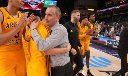 Arizona State University basketball coach Bobby Hurley congratulates his players after defeating Saint Mary's College in the championship game of the 2024 Acrisure Men's Classic in Palm Desert, Calif., Nov. 29, 2024.