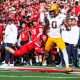Nov 30, 2024; Tucson, Arizona, USA; Arizona Wildcats Jack Luttrell defensive back Jack Luttrell (13) tackles Arizona State Sun Devils wide receiver Jordyn Tyson (0) during the first half at Arizona Stadium. Mandatory Credit: Aryanna Frank-Imagn Images