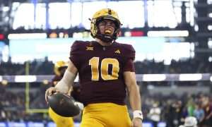 Dec 7, 2024; Arlington, TX, USA; Arizona State Sun Devils quarterback Sam Leavitt (10) reacts after running for a touchdown during the first quarter against the Iowa State Cyclones at AT&T Stadium. Mandatory Credit: Kevin Jairaj-Imagn Images