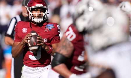 Oklahoma Sooners quarterback Michael Hawkins Jr. (9) drops back to pass during the Armed Forces Bowl football game between the University of Oklahoma Sooners (OU) and the Navy Midshipmen at Amon G. Carter Stadium in Fort Worth, Texas, Friday, Dec. 27, 2024. Navy won 21-20.
