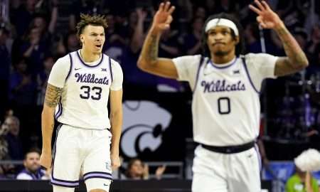 Dec 30, 2024; Manhattan, Kansas, USA; Kansas State Wildcats guard Coleman Hawkins (33) and guard Dug McDaniel (0) celebrate during the first half against the Cincinnati Bearcats at Bramlage Coliseum. Mandatory Credit: Jay Biggerstaff-Imagn Images