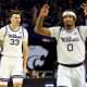 Dec 30, 2024; Manhattan, Kansas, USA; Kansas State Wildcats guard Coleman Hawkins (33) and guard Dug McDaniel (0) celebrate during the first half against the Cincinnati Bearcats at Bramlage Coliseum. Mandatory Credit: Jay Biggerstaff-Imagn Images