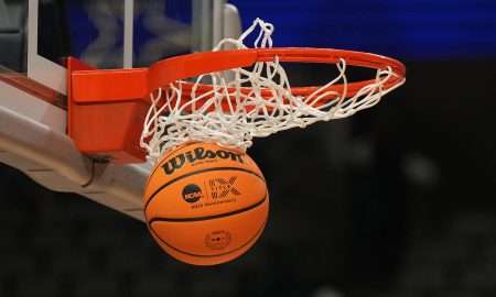 Mar 30, 2023; Dallas, TX, USA; A Wilson EVO NXT basketball with the Title IX 50th Anniversary logo goes through the rim and net at American Airlines Center. Mandatory Credit: Kirby Lee-USA TODAY Sports