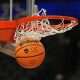 Mar 30, 2023; Dallas, TX, USA; A Wilson EVO NXT basketball with the Title IX 50th Anniversary logo goes through the rim and net at American Airlines Center. Mandatory Credit: Kirby Lee-USA TODAY Sports