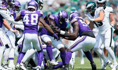 Aug 24, 2024; Philadelphia, Pennsylvania, USA; Minnesota Vikings defensive tackle Jalen Redmond (61) recovers a fumble against the Philadelphia Eagles during the first quarter at Lincoln Financial Field. Mandatory Credit: Caean Couto-USA TODAY Sports