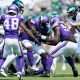 Aug 24, 2024; Philadelphia, Pennsylvania, USA; Minnesota Vikings defensive tackle Jalen Redmond (61) recovers a fumble against the Philadelphia Eagles during the first quarter at Lincoln Financial Field. Mandatory Credit: Caean Couto-USA TODAY Sports