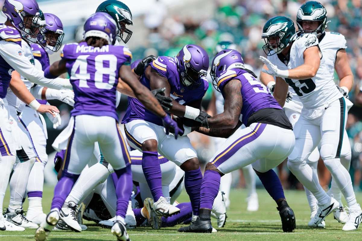 Aug 24, 2024; Philadelphia, Pennsylvania, USA; Minnesota Vikings defensive tackle Jalen Redmond (61) recovers a fumble against the Philadelphia Eagles during the first quarter at Lincoln Financial Field. Mandatory Credit: Caean Couto-USA TODAY Sports