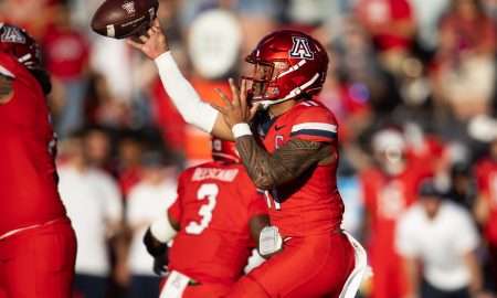 Nov 30, 2024; Tucson, Arizona, USA; Arizona Wildcats quarterback Noah Fifita (11) against the Arizona State Sun Devils in the second half during the Territorial Cup at Arizona Stadium. Mandatory Credit: Mark J. Rebilas-Imagn Images